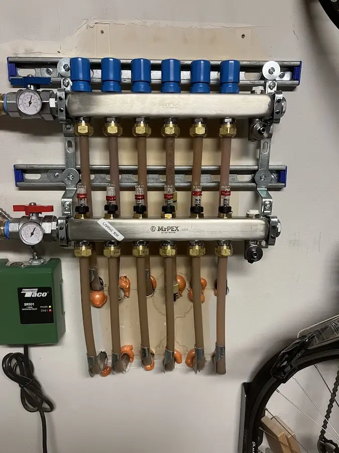 Plumber performing Water Heater Repair at a residential property in Sumner